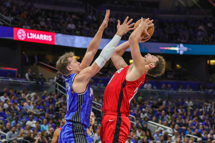 Houston Rockets center Alperen Sengun (28) is fouled by Orlando Magic center Moritz Wagner (21) during the second half at Amway Center.